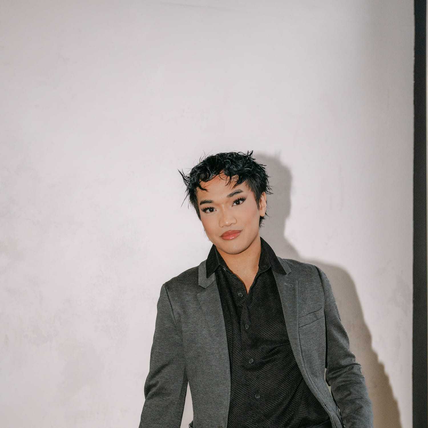 Portrait of Jai Jiminez, a professional stylist at Chromatique Salon, showcasing their expertise and style.