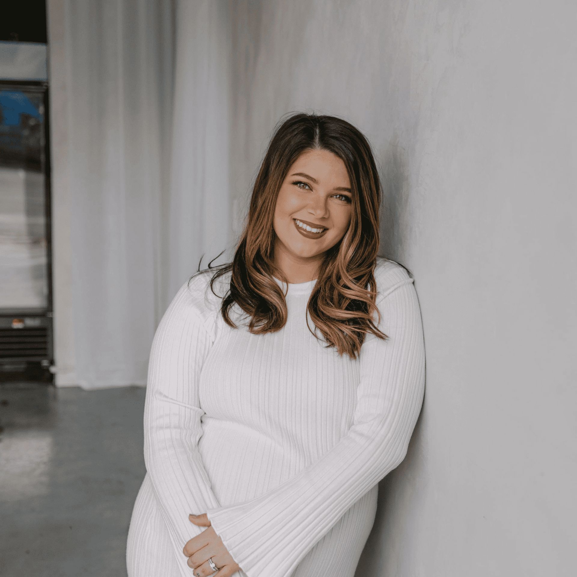 Portrait of Maddy Taylor, a professional stylist at Chromatique Salon, showcasing their expertise and style.