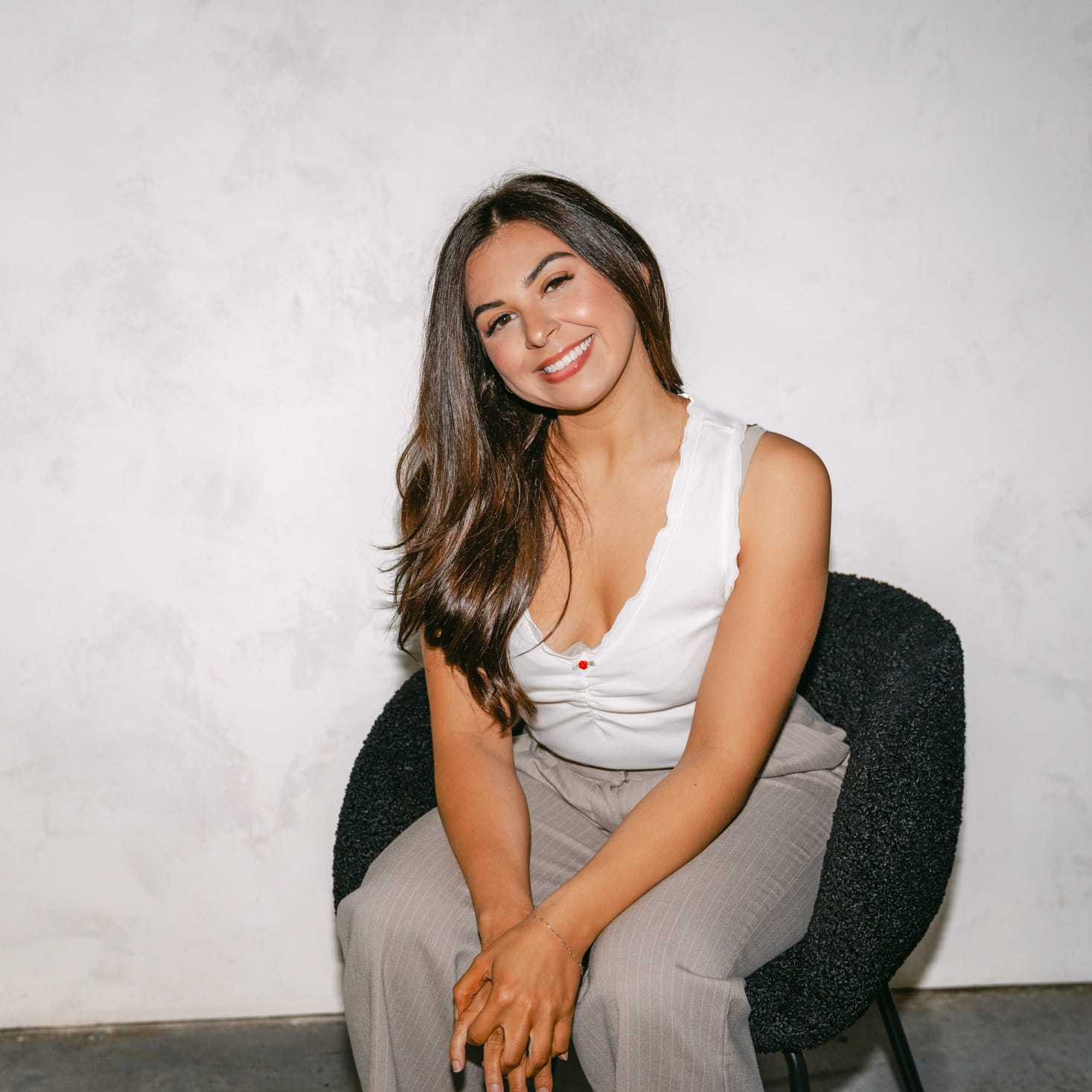 Portrait of Antonia Martinez, a professional stylist at Chromatique Salon, showcasing their expertise and style.